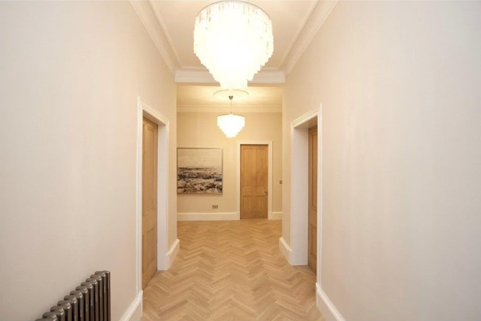 Period hallway with restored cornice detail and freshly finished plaster walls